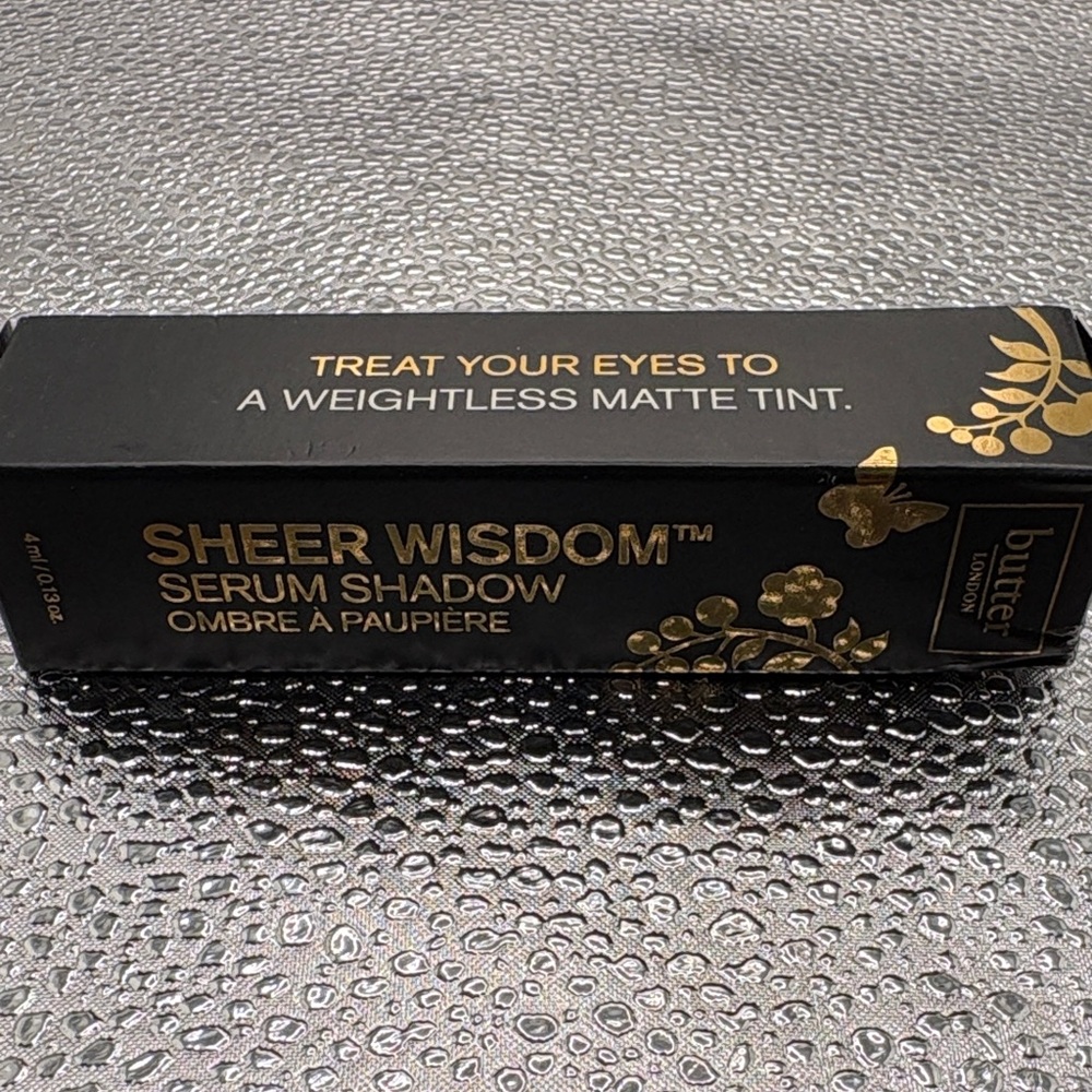 butter LONDON Sheer Wisdom Serum Shadow - Black with Gold Accents